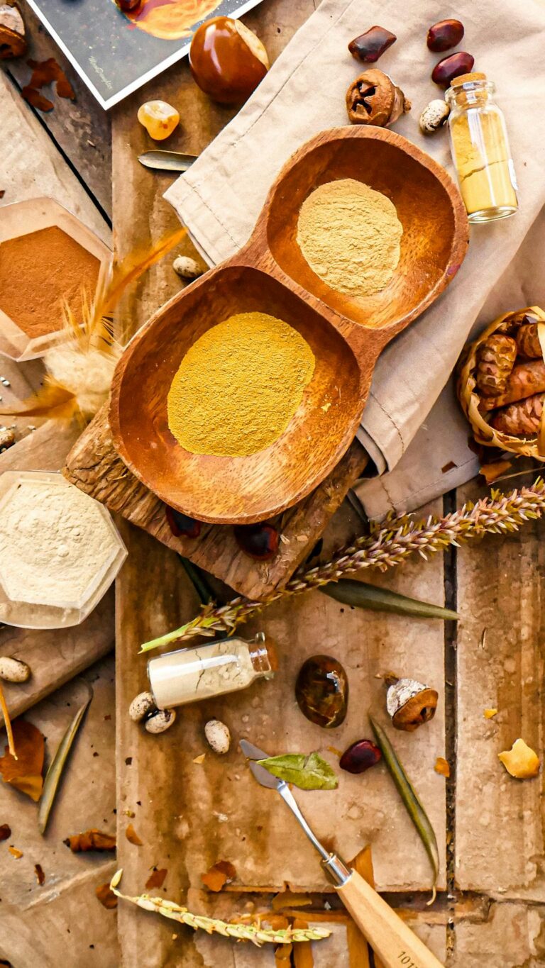 Aerial view of traditional Peruvian spices and ingredients on a wooden table, showcasing earthy and organic textures.